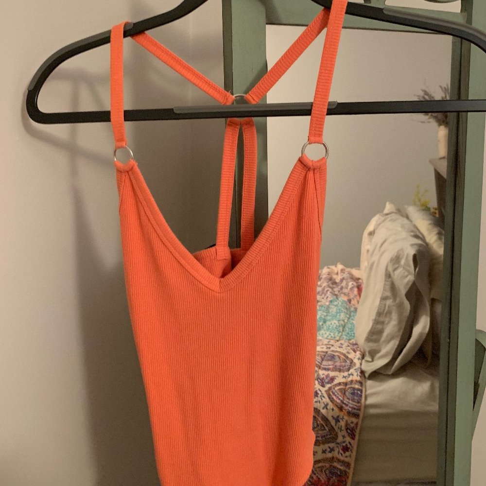Orange bodysuit